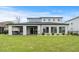 House exterior showcasing backyard and landscaping at 215 82Nd Ave. N, Myrtle Beach, SC 29572