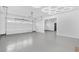 Bright, spacious garage with epoxy flooring and modern overhead door at 215 82Nd Ave. N, Myrtle Beach, SC 29572