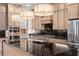 Modern kitchen with stainless steel appliances and granite countertops at 215 82Nd Ave. N, Myrtle Beach, SC 29572