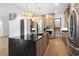 Modern kitchen with island, stainless steel appliances, and walk-in pantry at 215 82Nd Ave. N, Myrtle Beach, SC 29572