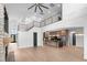 Open floor plan with kitchen, living room, and staircase at 215 82Nd Ave. N, Myrtle Beach, SC 29572