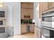 Built-in wet bar with wine rack and beverage fridge at 215 82Nd Ave. N, Myrtle Beach, SC 29572