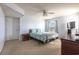 Comfortable bedroom with carpet, ceiling fan, closet, and window at 2268 Essex Dr. # L, Surfside Beach, SC 29575