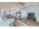 Open living room featuring stylish furniture, modern flooring, and a view of the kitchen at 2268 Essex Dr. # L, Surfside Beach, SC 29575