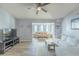 Comfortable living room with hardwood floors, tv, and plenty of space at 2268 Essex Dr. # L, Surfside Beach, SC 29575