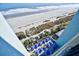Aerial view of beach, showing patio furniture and ocean access at 2401 S Ocean Blvd. # 1160, Myrtle Beach, SC 29577