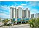 Oceanfront resort building with pool and parking at 2401 S Ocean Blvd. # 1160, Myrtle Beach, SC 29577