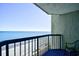 Stunning ocean view from condo balcony, featuring comfortable chair at 2401 S Ocean Blvd. # 1160, Myrtle Beach, SC 29577