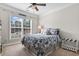 Bright bedroom with a queen-size bed and large window at 2450 Craven Dr., Myrtle Beach, SC 29579