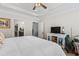 The bedroom features a decorative ceiling with fan, carpet flooring and access to both the bathroom and closet at 2450 Craven Dr., Myrtle Beach, SC 29579