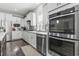 Well-equipped kitchen featuring stainless steel appliances, white cabinets, and granite countertops at 2450 Craven Dr., Myrtle Beach, SC 29579