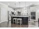 Modern kitchen island with seating, stainless steel appliances, and white cabinets at 2450 Craven Dr., Myrtle Beach, SC 29579