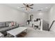 Cozy loft area with comfortable seating, a modern desk setup, and soft lighting, creating a versatile space at 2450 Craven Dr., Myrtle Beach, SC 29579