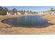 Community pond with scenic views of houses at 249 Moonglow Circle # 201, Murrells Inlet, SC 29576