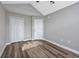 Bedroom with double doors and wood-look flooring at 2623 Corn Pile Rd., Myrtle Beach, SC 29588