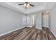 Spacious bedroom with wood-look flooring and ceiling fan at 2623 Corn Pile Rd., Myrtle Beach, SC 29588