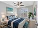 Virtually staged bedroom with a queen bed and ocean-themed decor at 2623 Corn Pile Rd., Myrtle Beach, SC 29588