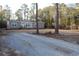 Tan mobile home with wood deck and landscaping at 2901 N Nichols Hwy., Nichols, SC 29581