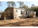 Tan mobile home with double deck at 2901 N Nichols Hwy., Nichols, SC 29581