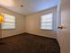 Simple bedroom with carpet and two windows at 334 Lincolnshire Dr., Georgetown, SC 29440