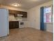 Efficient kitchen with wood cabinets and white appliances at 334 Lincolnshire Dr., Georgetown, SC 29440