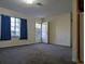 Living room with carpet and front door at 334 Lincolnshire Dr., Georgetown, SC 29440