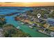 Stunning waterfront home with boat docks, lush landscaping, and incredible water views from above at 3545 Marion Ln., Murrells Inlet, SC 29576