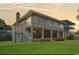 Beautifully landscaped home with an elevated outdoor living area and great curb appeal at 3545 Marion Ln., Murrells Inlet, SC 29576