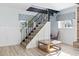 Staircase with natural light and hardwood flooring at 3545 Marion Ln., Murrells Inlet, SC 29576