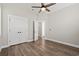 Spacious bedroom with hardwood floors and double doors to closet at 3647 Allentown Dr., Conway, SC 29526