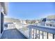 Spacious balcony with community and pool views at 3700 Golf Colony Dr. # 14-N, Little River, SC 29566