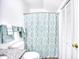 Clean bathroom with a shower/tub combo and granite vanity at 3700 Golf Colony Dr. # 14-N, Little River, SC 29566