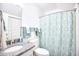 Clean bathroom with granite countertop, shower, and updated fixtures at 3700 Golf Colony Dr. # 14-N, Little River, SC 29566