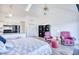 Bright bedroom with a comfy bed and relaxing sitting area at 3700 Golf Colony Dr. # 14-N, Little River, SC 29566
