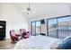 Bright bedroom with a queen bed, and access to a balcony at 3700 Golf Colony Dr. # 14-N, Little River, SC 29566