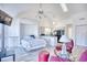 Cozy bedroom with a comfortable bed and built-in shelving at 3700 Golf Colony Dr. # 14-N, Little River, SC 29566