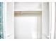White built-in closet with louvered doors and shelving at 3700 Golf Colony Dr. # 14-N, Little River, SC 29566