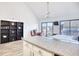 Open living space with balcony access and comfy seating at 3700 Golf Colony Dr. # 14-N, Little River, SC 29566