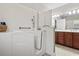 Bathroom features a walk in tub and vanity with brown cabinets at 400 Dog Pen Ct., Myrtle Beach, SC 29579