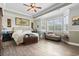 Bright and airy main bedroom with large windows and ceiling fan at 400 Dog Pen Ct., Myrtle Beach, SC 29579