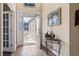 Welcoming foyer with decorative front door, stained glass, and hardwood floors at 400 Dog Pen Ct., Myrtle Beach, SC 29579