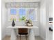 Bright home office nook with a modern desk and a decorative lamp at 4023 Bucolic Loop, Myrtle Beach, SC 29588