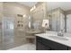 Modern walk-in shower features sleek tile, built-in niche, and frameless glass doors at 4023 Bucolic Loop, Myrtle Beach, SC 29588
