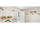 Walk-in closet with white wire shelving for clothes and storage baskets at 4023 Bucolic Loop, Myrtle Beach, SC 29588