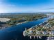 Expansive aerial view of waterfront community with lighthouse at 4200 Coquina Harbour Dr. # H3, Little River, SC 29566