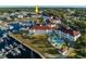 Aerial view of condo building near marina, highlighting location and amenities at 4200 Coquina Harbour Dr. # H3, Little River, SC 29566
