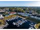 Aerial view of the property showing the building and marina at 4200 Coquina Harbour Dr. # H3, Little River, SC 29566
