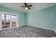 Bedroom with sliding glass doors leading to a balcony at 4200 Coquina Harbour Dr. # H3, Little River, SC 29566