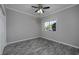 Bright bedroom featuring gray walls, wood-look tile floors, and a window with blinds at 4200 Coquina Harbour Dr. # H3, Little River, SC 29566