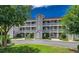 Attractive three-story building with balconies and landscaping at 4200 Coquina Harbour Dr. # H3, Little River, SC 29566